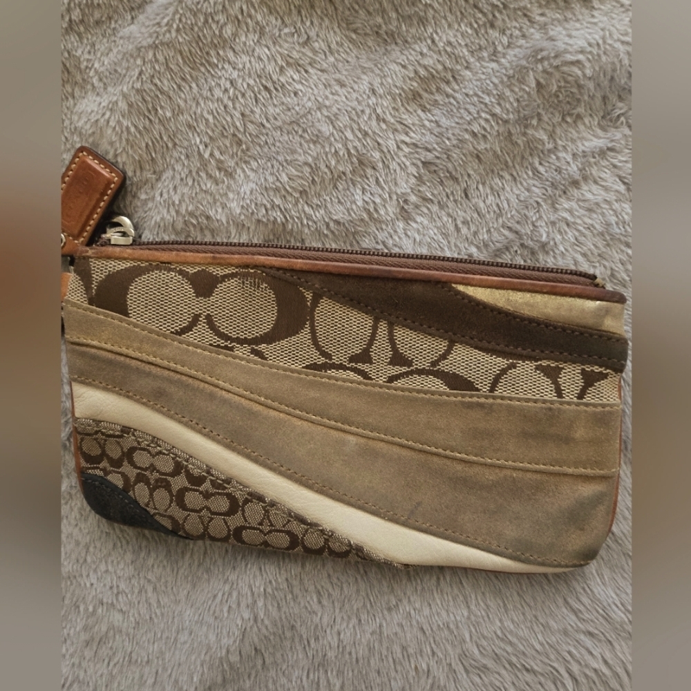 Coach Beautiful Brown, Cream, and Tan wristlet! Great condition!